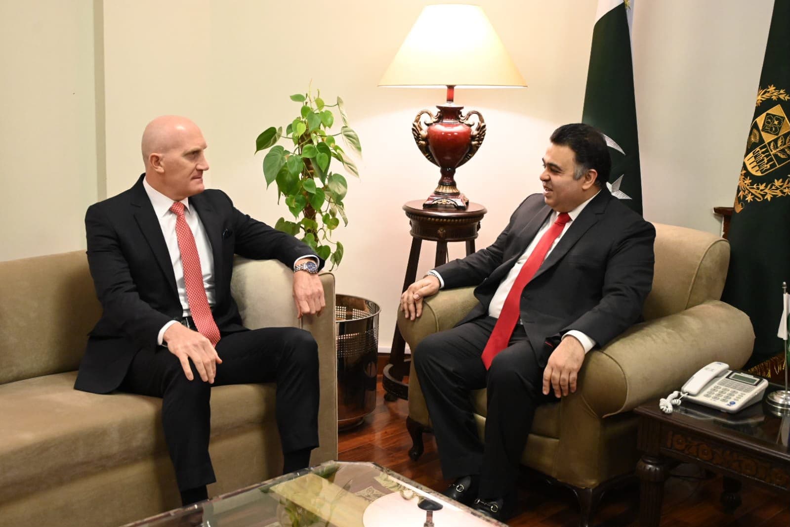 Ambassador Abdul Aziz Issa in conversation with Minister of State Fahd Haroon during their meeting in Islamabad.